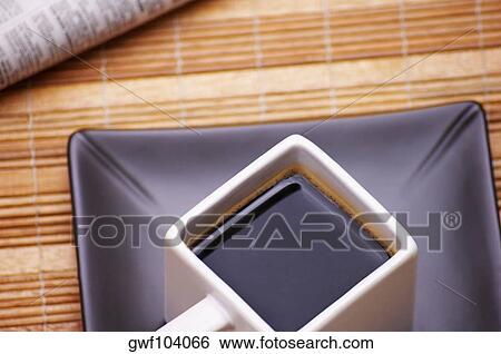 High angle view of a cup of black coffee View Large Photo Image Stock Photograph - High angle view of a cup of black coffee. Fotosearch