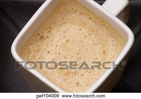 High angle view of a cup of coffee View Large Photo Image Stock Photo - High angle view of a cup of coffee. Fotosearch