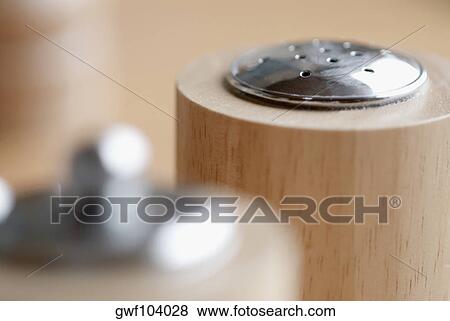 High angle view of salt and pepper shakers View Large Photo Image Stock Photo - High angle view of salt and pepper shakers. Fotosearch