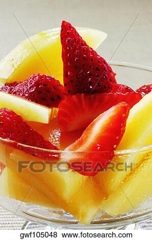 Close-up of a bowl of fruit salad View Large Photo Image Stock Photo - Close-up of a bowl of fruit salad. Fotosearch
