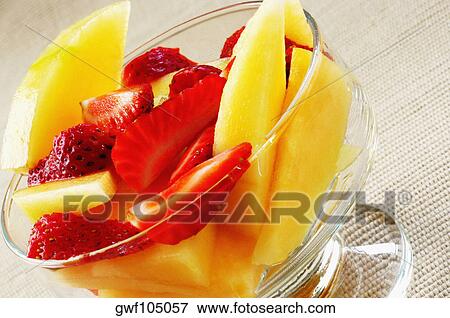 Close-up of a bowl of fruit salad View Large Photo Image Stock Photo - Close-up of a bowl of fruit salad. Fotosearch