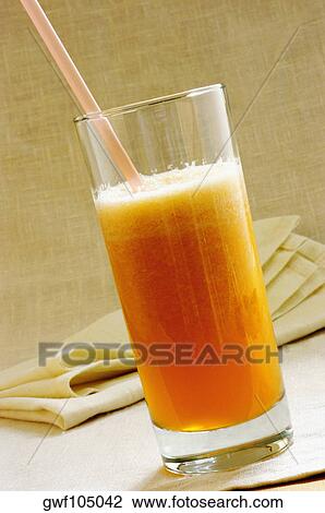 Close-up of a glass of juice View Large Photo Image Stock Image - Close-up of a glass of juice. Fotosearch