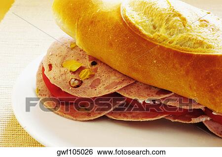 Close-up of a sandwich on a plate View Large Photo Image Stock Photograph - Close-up of a sandwich on a plate. Fotosearch