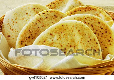 Close-up of bread in a basket View Large Photo Image Stock Image - Close-up of bread in a basket. Fotosearch