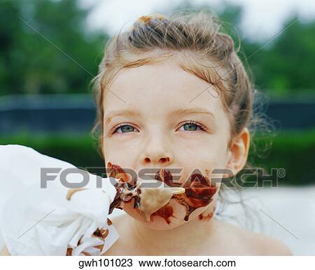Close-up of a girl eating an ice cream, Bermuda View Large Photo Image Stock Image - Close-up of a girl eating an ice cream, Bermuda. Fotosearch
