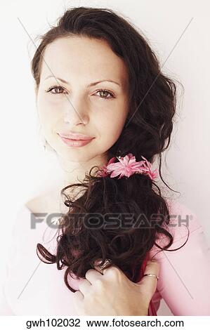 Portrait of a young woman grinning View Large Photo Image Stock Image - Portrait of a young woman grinning. Fotosearch