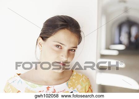 Portrait of a young woman View Large Photo Image Stock Photo - Portrait of a young woman. Fotosearch