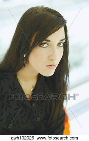 Portrait of a young woman View Large Photo Image Stock Photograph - Portrait of a young woman. Fotosearch