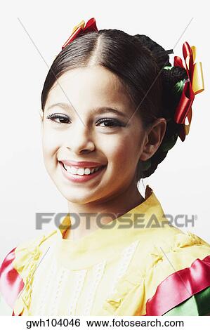 Portrait of a girl wearing traditional clothing and smiling View Large Photo Image Stock Photograph - Portrait of a girl wearing traditional clothing and smiling. Fotosearch