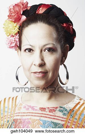 Portrait of a mid adult woman smiling View Large Photo Image Stock Photo - Portrait of a mid adult woman smiling. Fotosearch