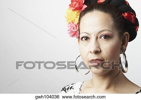 Portrait of a mid adult woman thinking View Large Photo Image Stock Photograph - Portrait of a mid adult woman thinking. Fotosearch