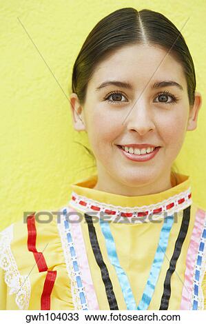 Portrait of a young woman smiling View Large Photo Image Stock Image - Portrait of a young woman smiling. Fotosearch