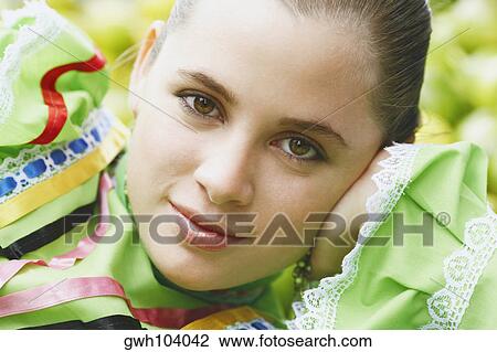Portrait of a young woman smiling View Large Photo Image Stock Image - Portrait of a young woman smiling. Fotosearch