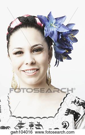 Stock Photograph - Portrait of a young woman smiling. Fotosearch