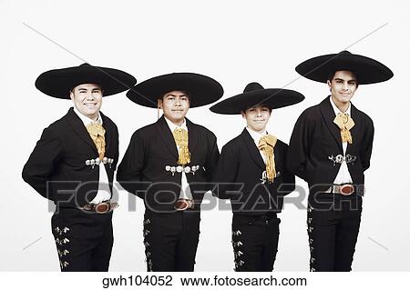 Stock Image - Portrait of four people in traditional clothing. Fotosearch