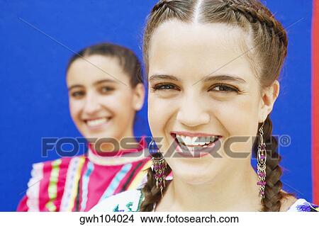 Picture - Portrait of two young women smiling. Fotosearch