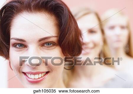 Portrait of a young woman smiling View Large Photo Image Stock Photography - Portrait of a young woman smiling. Fotosearch