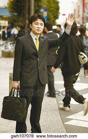 Businessman making a stop sign View Large Photo Image Stock Photo - Businessman making a stop sign . Fotosearch