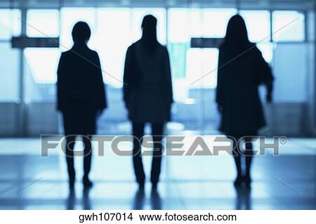 Silhouette of three women walking View Large Photo Image Picture - Silhouette of three women walking. Fotosearch