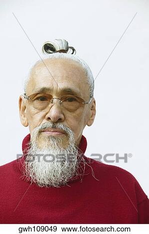 Portrait of a senior man wearing eyeglasses View Large Photo Image Stock Photo - Portrait of a senior man wearing eyeglasses. Fotosearch
