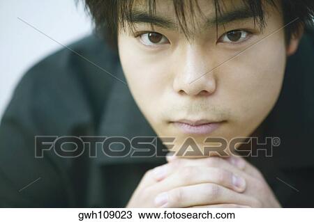 Portrait of a young man View Large Photo Image Stock Image - Portrait of a young man. Fotosearch