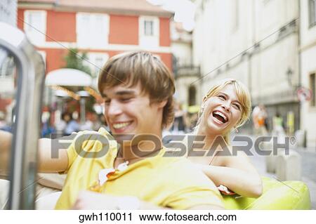 Stock Image - Young couple in a car . Fotosearch