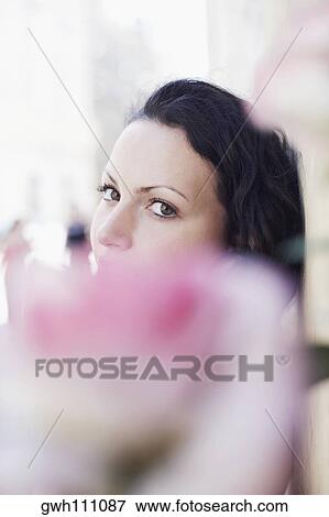Close-up of a young woman View Large Photo Image Stock Photo - Close-up of a young woman. Fotosearch