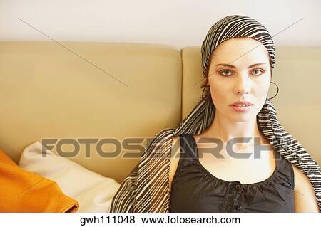 Portrait of a young woman View Large Photo Image Stock Photo - Portrait of a young woman. Fotosearch