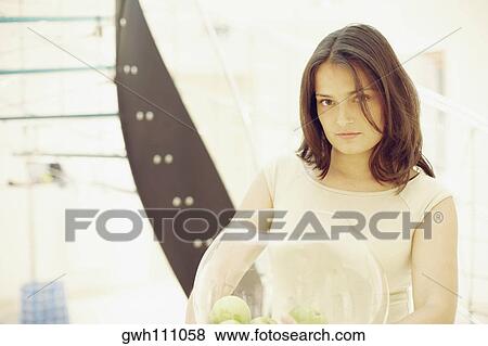 Portrait of a young woman View Large Photo Image Stock Photo - Portrait of a young woman. Fotosearch