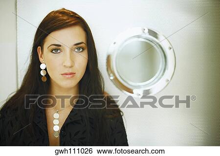 Stock Photograph - Portrait of a young woman. Fotosearch