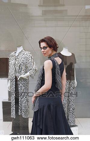 Side profile of a young woman posing View Large Photo Image Stock Image - Side profile of a young woman posing. Fotosearch