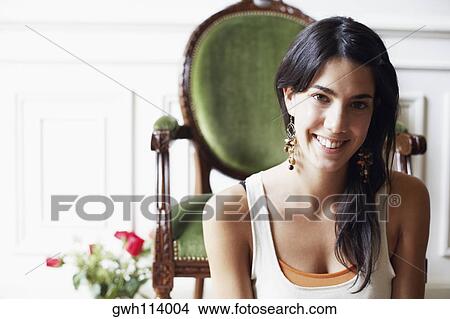 Picture - Portrait of a young woman smiling. Fotosearch