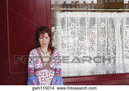 Portrait of a young woman smiling View Large Photo Image Picture - Portrait of a young woman smiling . Fotosearch