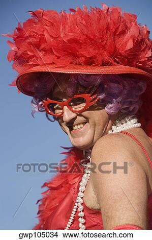 Close-up of a gay man in a costume View Large Photo Image Picture - Close-up of a gay man in a costume. Fotosearch