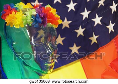 Close-up of a transparent statue with a flag in the background View Large Photo Image Stock Photo - Close-up of a transparent statue with a flag in the background. Fotosearch