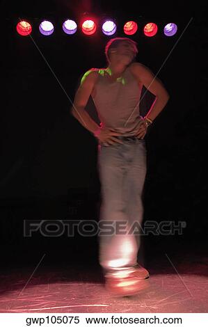 Gay man dancing on stage View Large Photo Image Stock Photography - Gay man dancing on stage. Fotosearch