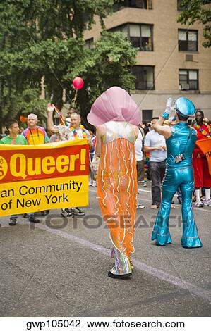 Group of people at a gay parade View Large Photo Image Stock Image - Group of people at a gay parade. Fotosearch