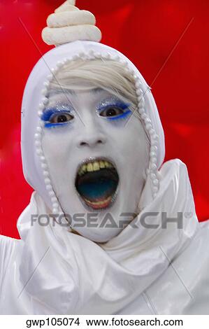 Portrait of a girl with a painted face shouting View Large Photo Image Picture - Portrait of a girl with a painted face shouting. Fotosearch