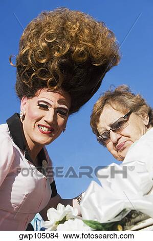 Picture - Portrait of a mature woman with a gay man. Fotosearch