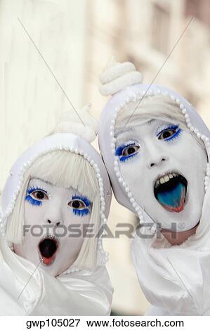 Portrait of two girls with painted face shouting at a gay parade View Large Photo Image Stock Photo - Portrait of two girls with painted face shouting at a gay parade. Fotosearch