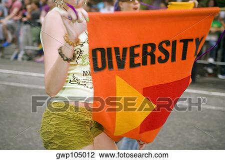 Side profile of two lesbian women holding a banner and walking on the street View Large Photo Image Stock Image - Side profile of two lesbian women holding a banner and walking on the street. Fotosearch