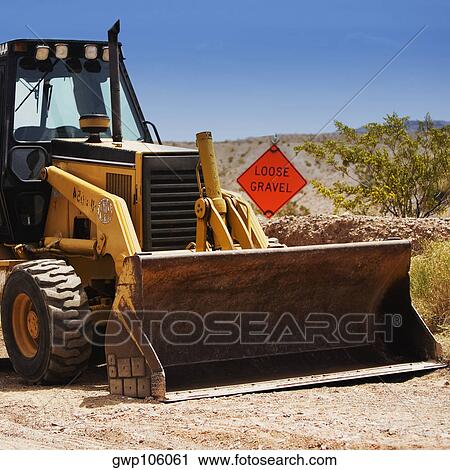 Bulldozer at a construction site View Large Photo Image Stock Image - Bulldozer at a construction site. Fotosearch
