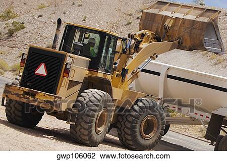 Bulldozer at a construction site View Large Photo Image Stock Image - Bulldozer at a construction site. Fotosearch