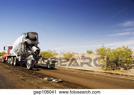 Cement truck on a road View Large Photo Image Stock Image - Cement truck on a road. Fotosearch