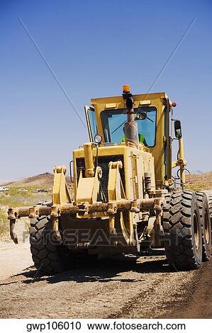 Stock Image - Close-up of a bulldozer. Fotosearch