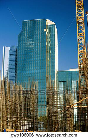 Low angle view of construction site in front of a skyscraper, Miami, Florida, USA View Large Photo Image Stock Photograph - Low angle view of construction site in front of a skyscraper, Miami, Florida, USA. Fotosearch