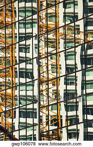 Reflection of a crane on a building, Miami, Florida, USA View Large Photo Image Stock Photo - Reflection of a crane on a building, Miami, Florida, USA. Fotosearch