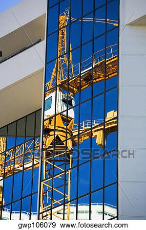 Reflection of a crane on a building, Miami, Florida, USA View Large Photo Image Stock Photo - Reflection of a crane on a building, Miami, Florida, USA. Fotosearch