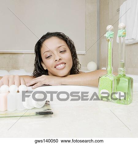 Close-up of a teenage girl having bath View Large Photo Image Stock Image - Close-up of a teenage girl having bath. Fotosearch