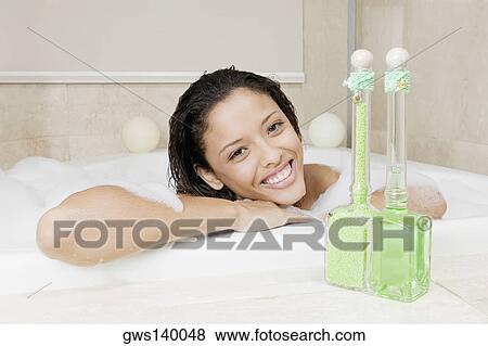 Portrait of a teenage girl having a bath View Large Photo Image Stock Photo - Portrait of a teenage girl having a bath. Fotosearch